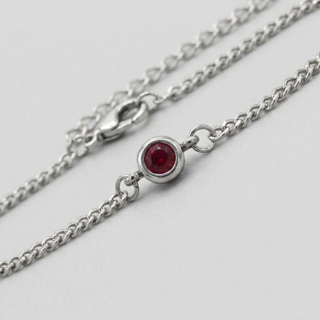 Ruby Solitaire Silver Curb Chain Bracelet