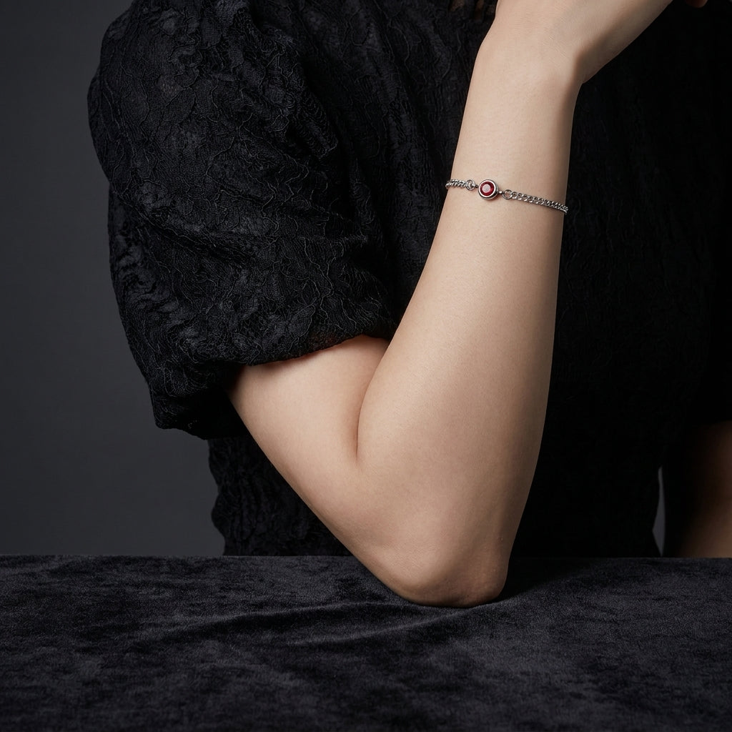 Ruby Solitaire Silver Curb Chain Bracelet