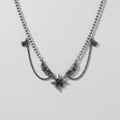 Winged Star Black Crystal Draped Necklace